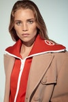 Rebecca Longendyke @ Elite: cappotto di lana e felpa di cotone con zip, Versace.