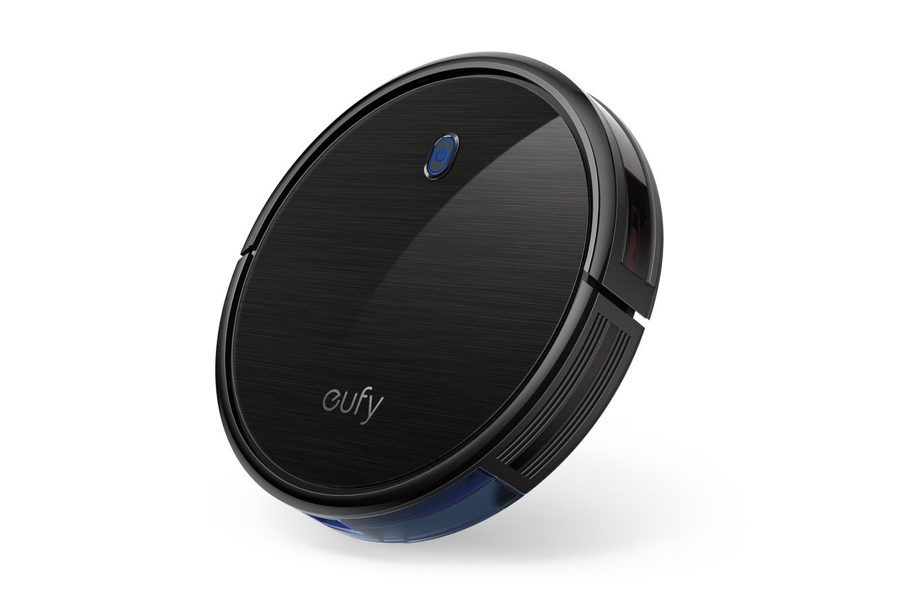 A black robot vacuum 