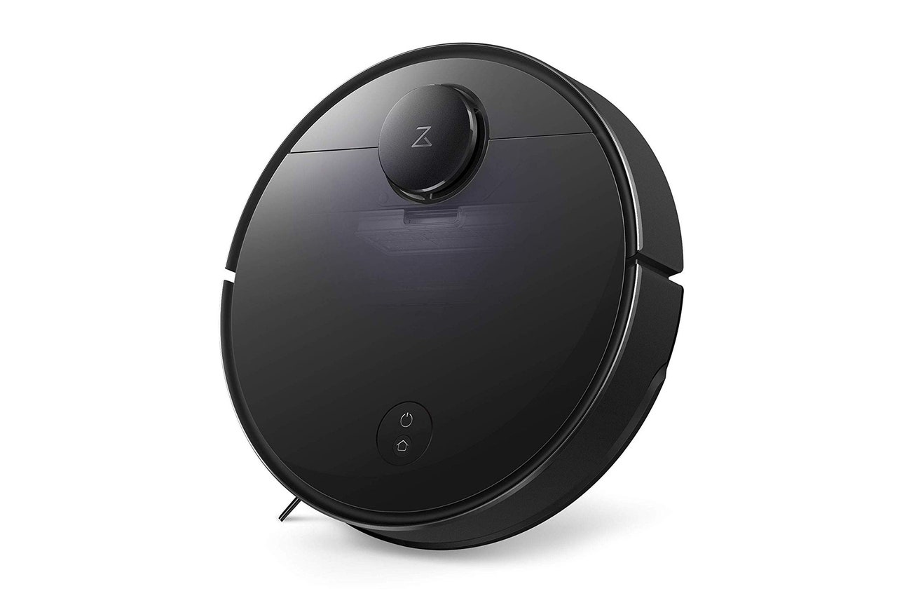 A black robot vacuum 