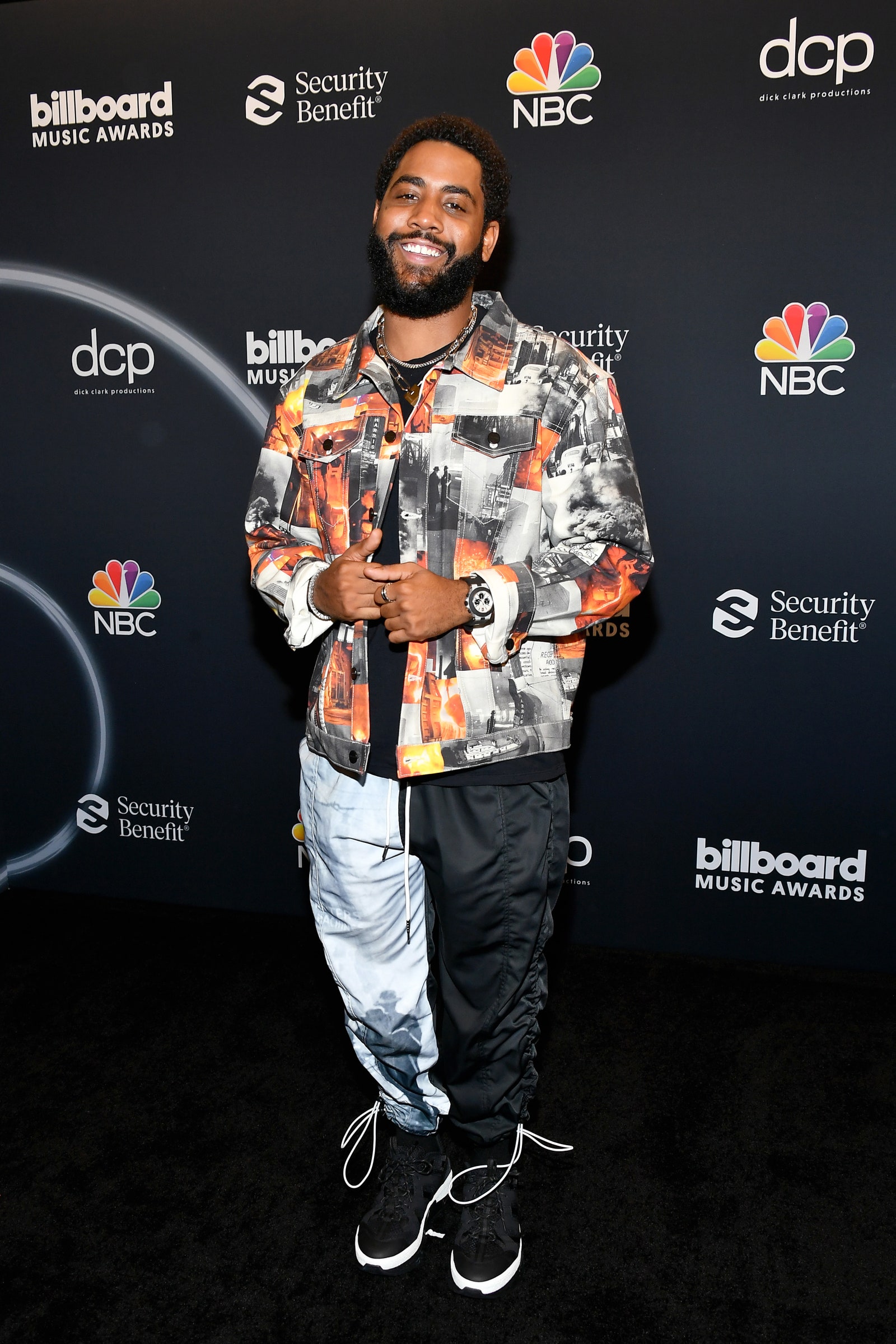 Jharrel Jerome poses backstage at the 2020 Billboard Music Awards