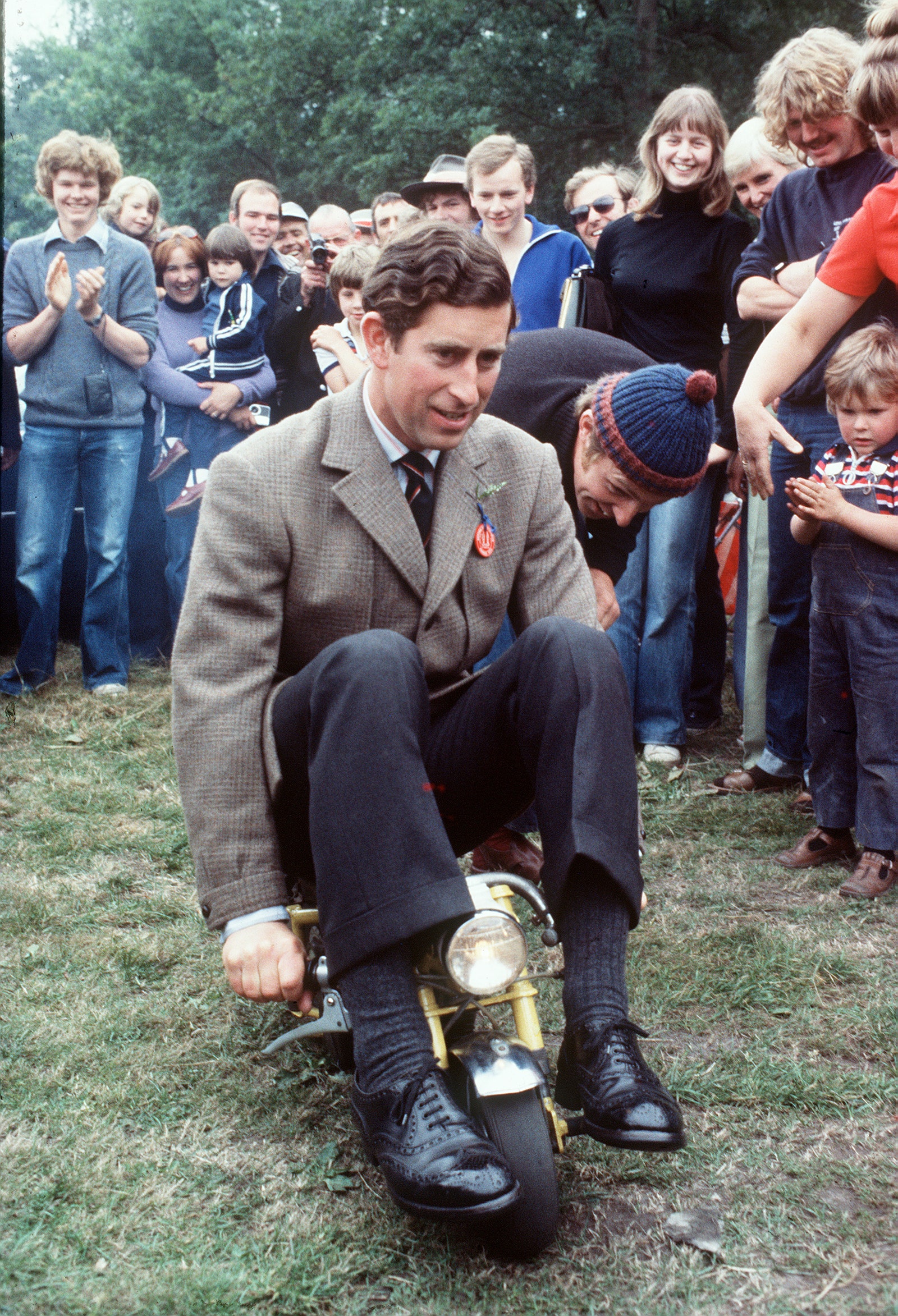 pPrince Charles on a mini bike in Bisley England July 1978.p 