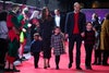 Louis, Kate, Charlotte, William e George di Cambridge a Londra l'11 dicembre