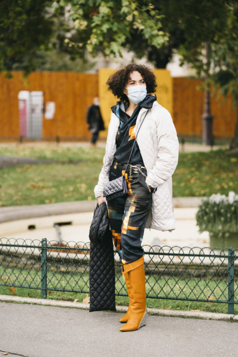 quilted jacket pants tucked into boots