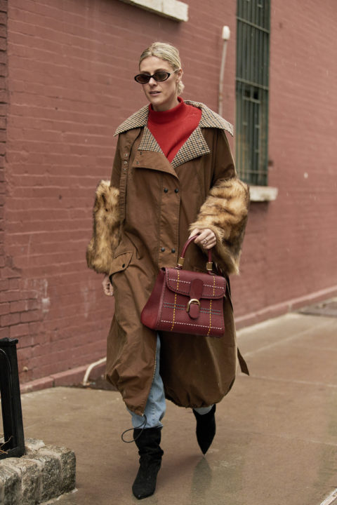 brown trench pants tucked into boots