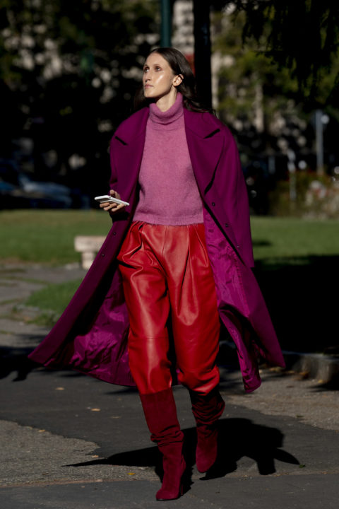 red leather pants tucked into boots