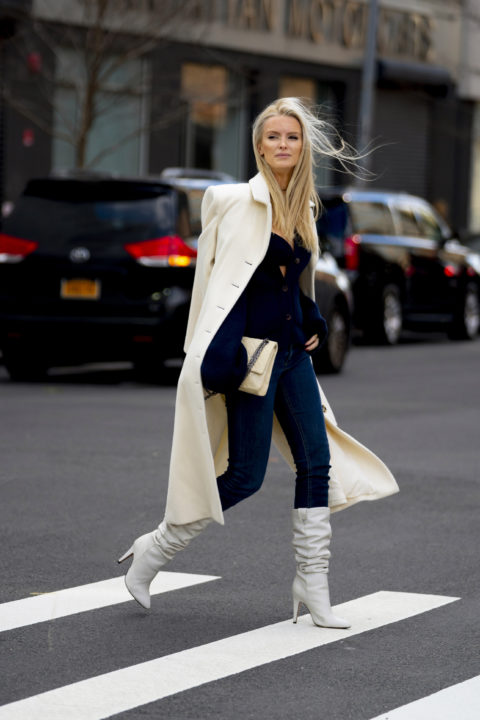 white coat pants tucked into boots