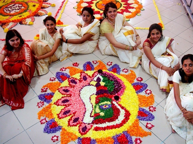 Kerala womens with onam pookalam