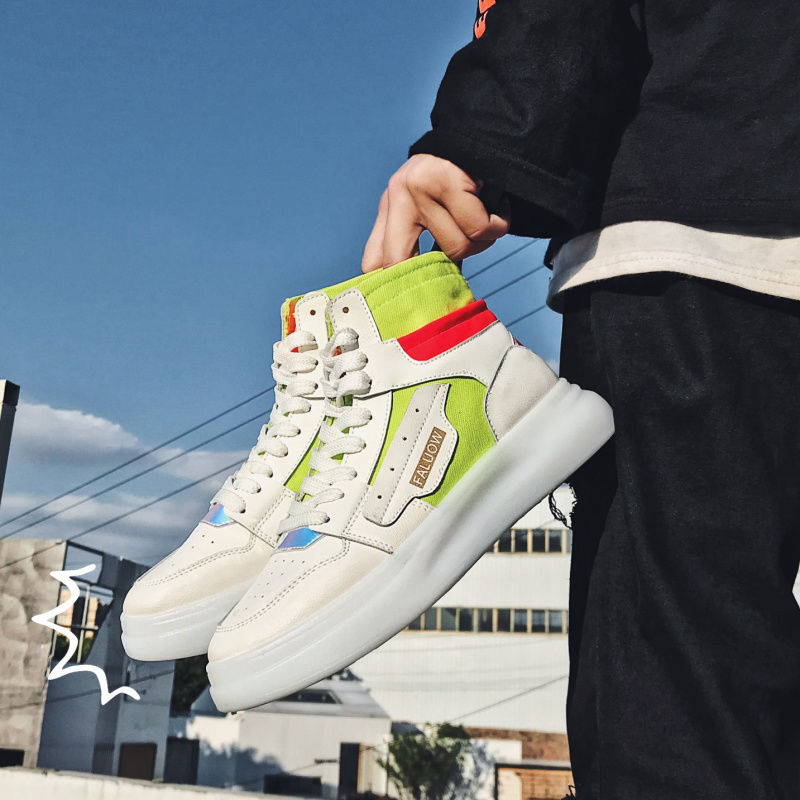 White, neon green and orange high-top sneakers