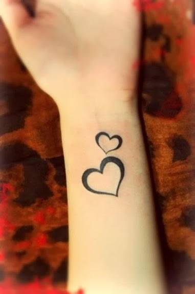 Love Symbol Wrist Tattoo