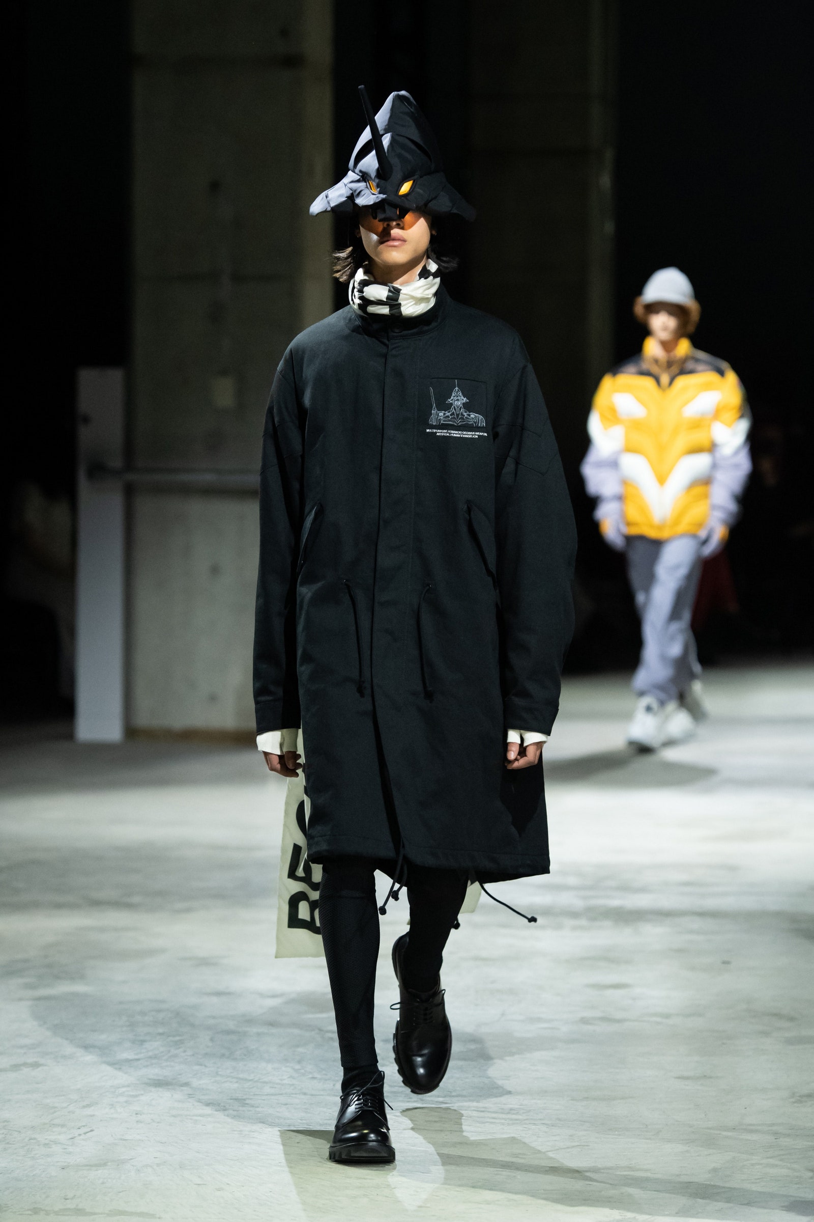 pA parka emblazoned with an Evangelionand a horned hat to match.p 