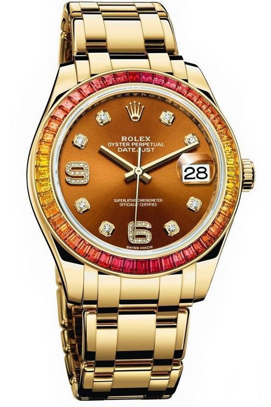 A gold watch with orange and red diamonds in the bezel