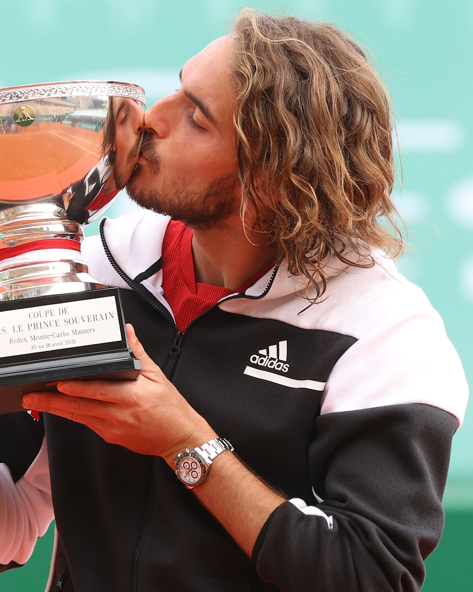 Stefanos Tsitsipas of Greece poses with the winners trophy after the Men's Final match on day eight of the Rolex...