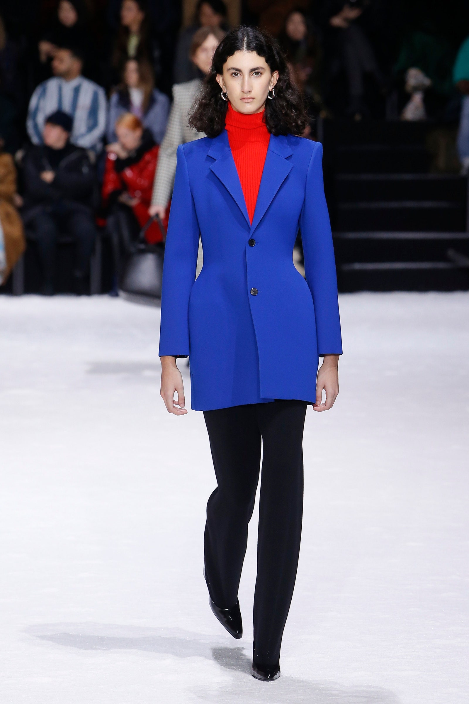 Image may contain Clothing Apparel Coat Human Person Suit Overcoat Runway Female and Fashion