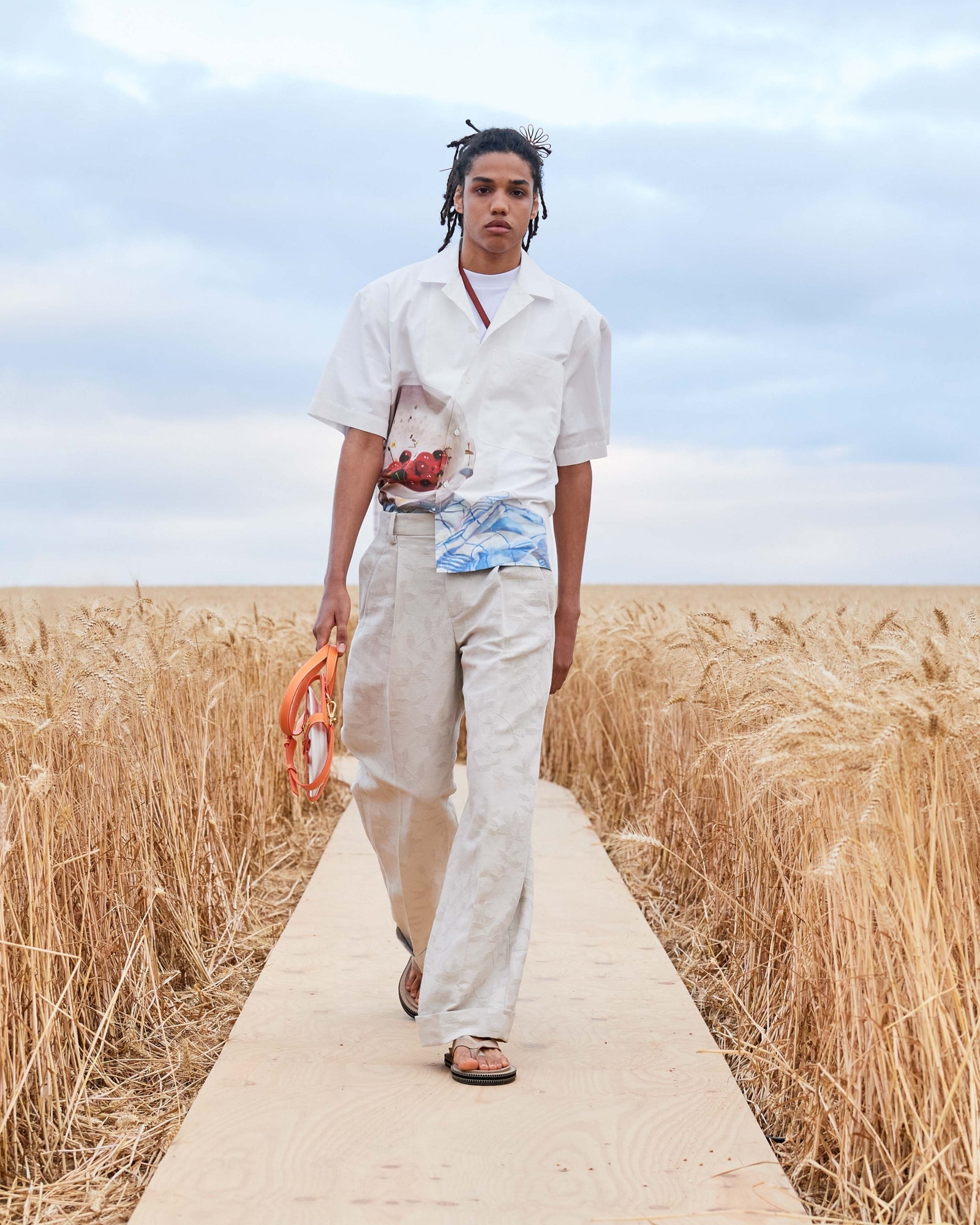 Cherries on the move at Jacquemus's Spring 2021 show.