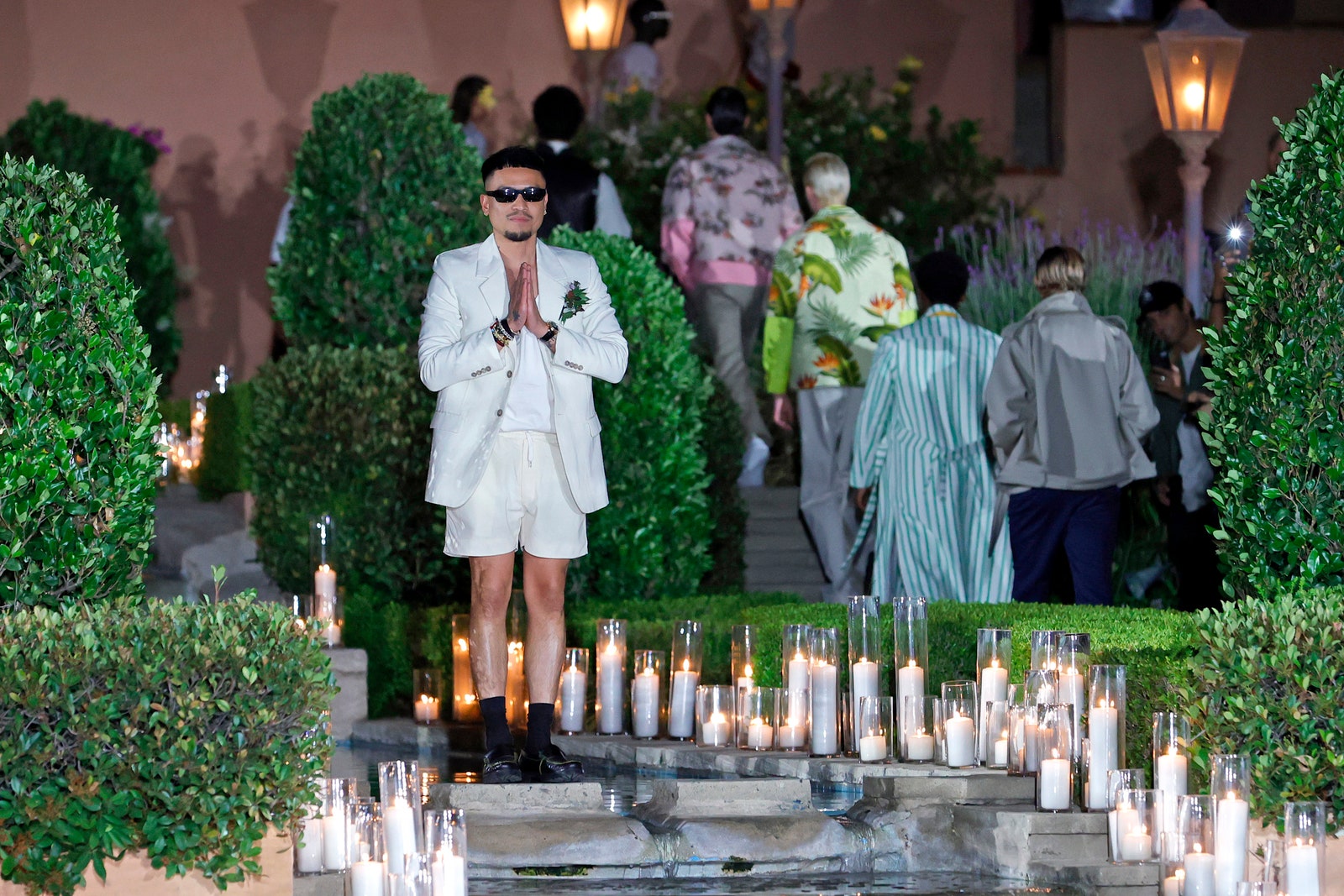 Rhude designer Rhuigi Villaseor takes his postshow bow in shorts.