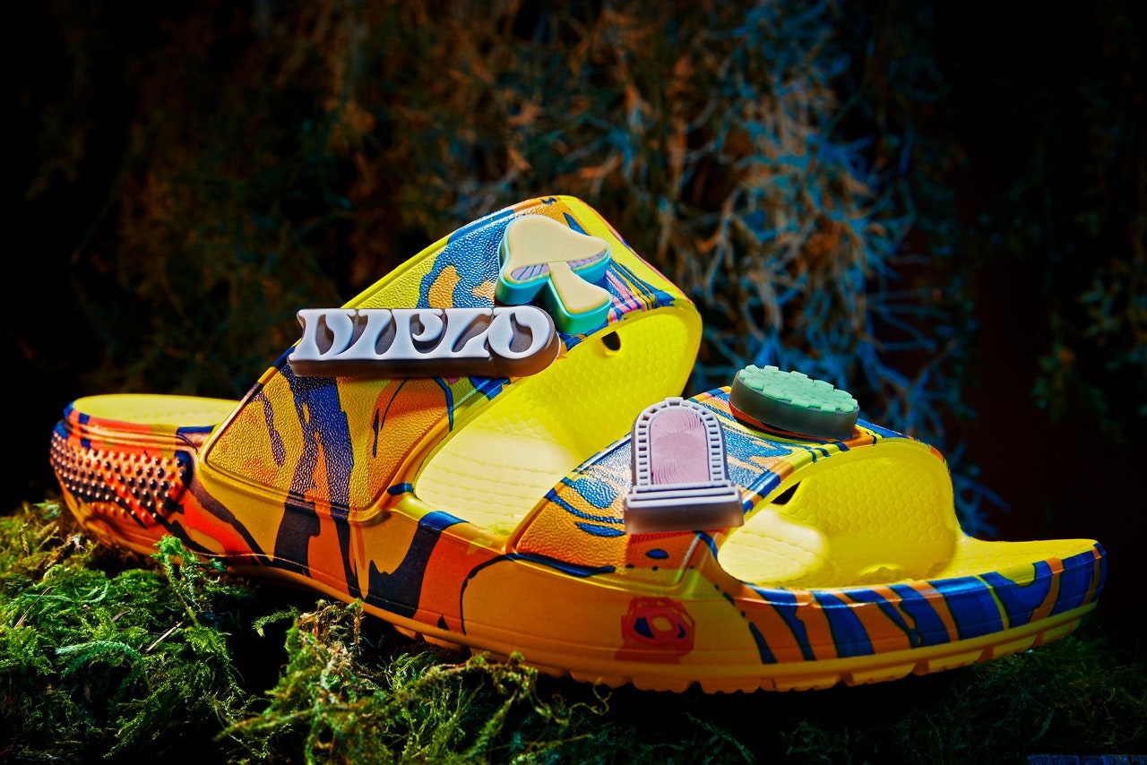 Image may contain Clothing Apparel Footwear Shoe Grass and Plant