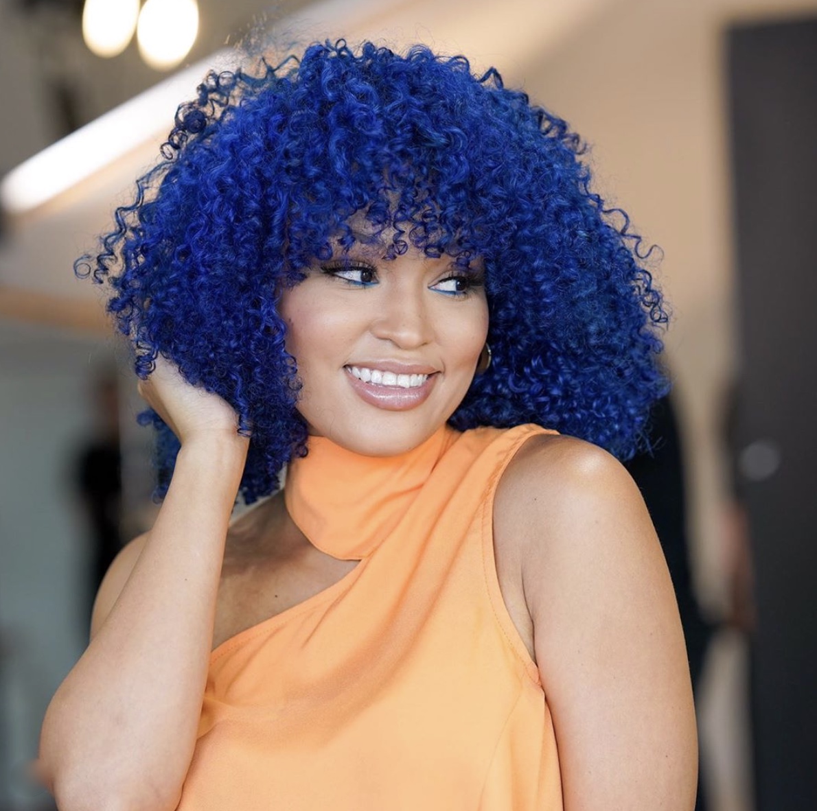 blue curly afro with bangs short hairstyles stylerave