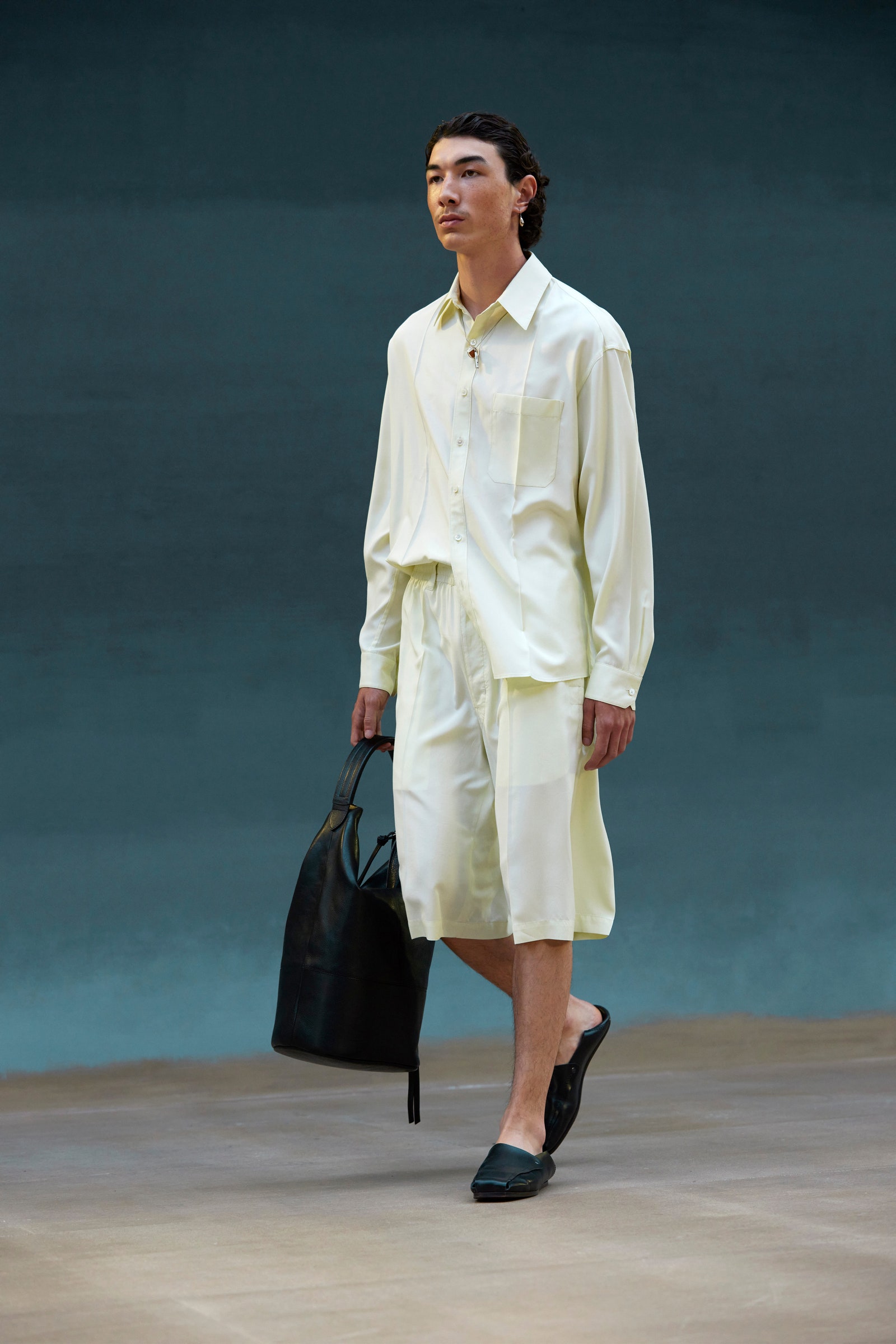Image may contain Clothing Apparel Sleeve Human Person Arthur Mariano Shoe Footwear Long Sleeve and Shirt