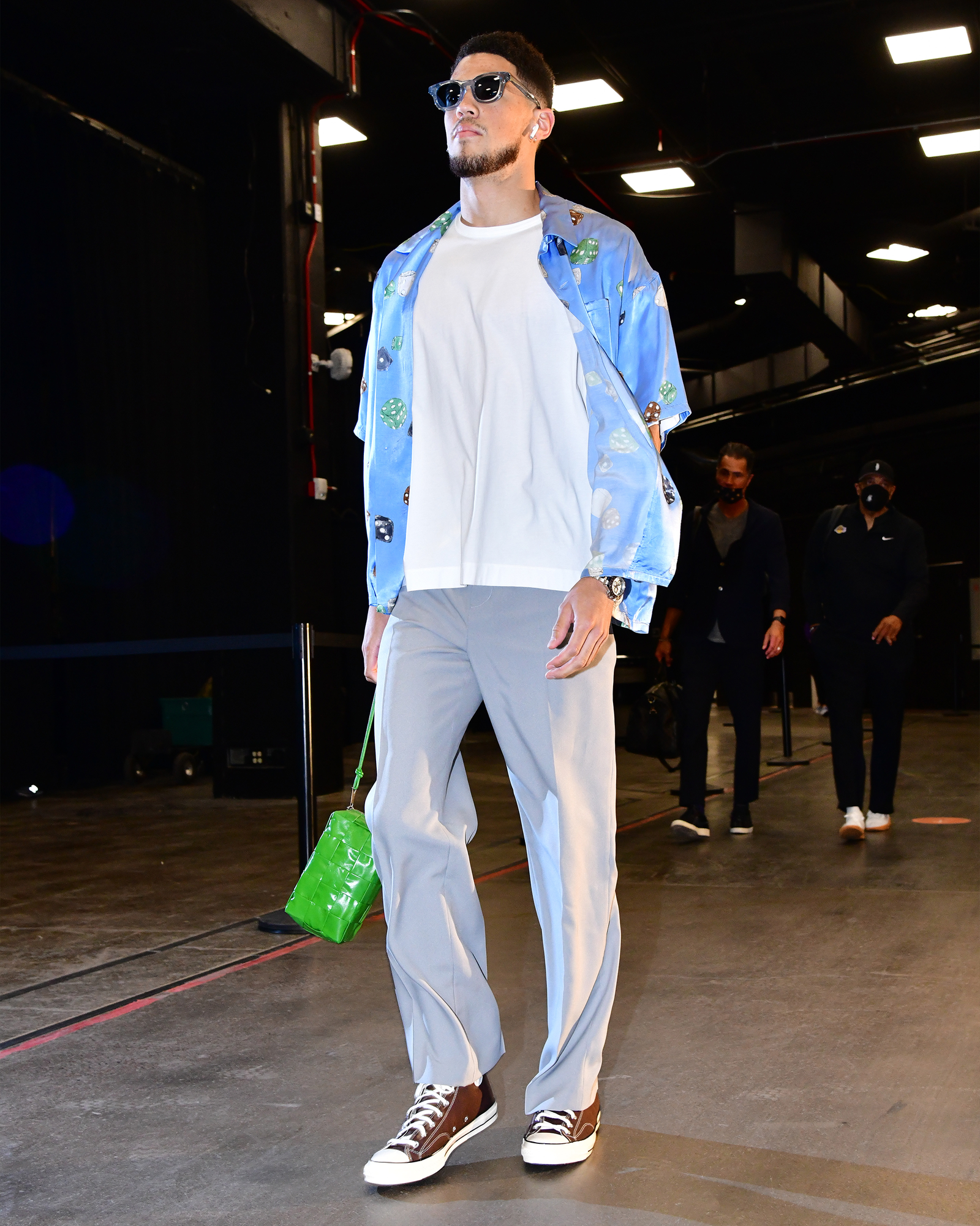Image may contain Footwear Clothing Shoe Apparel Sleeve Human Person Kay One Long Sleeve and Sunglasses