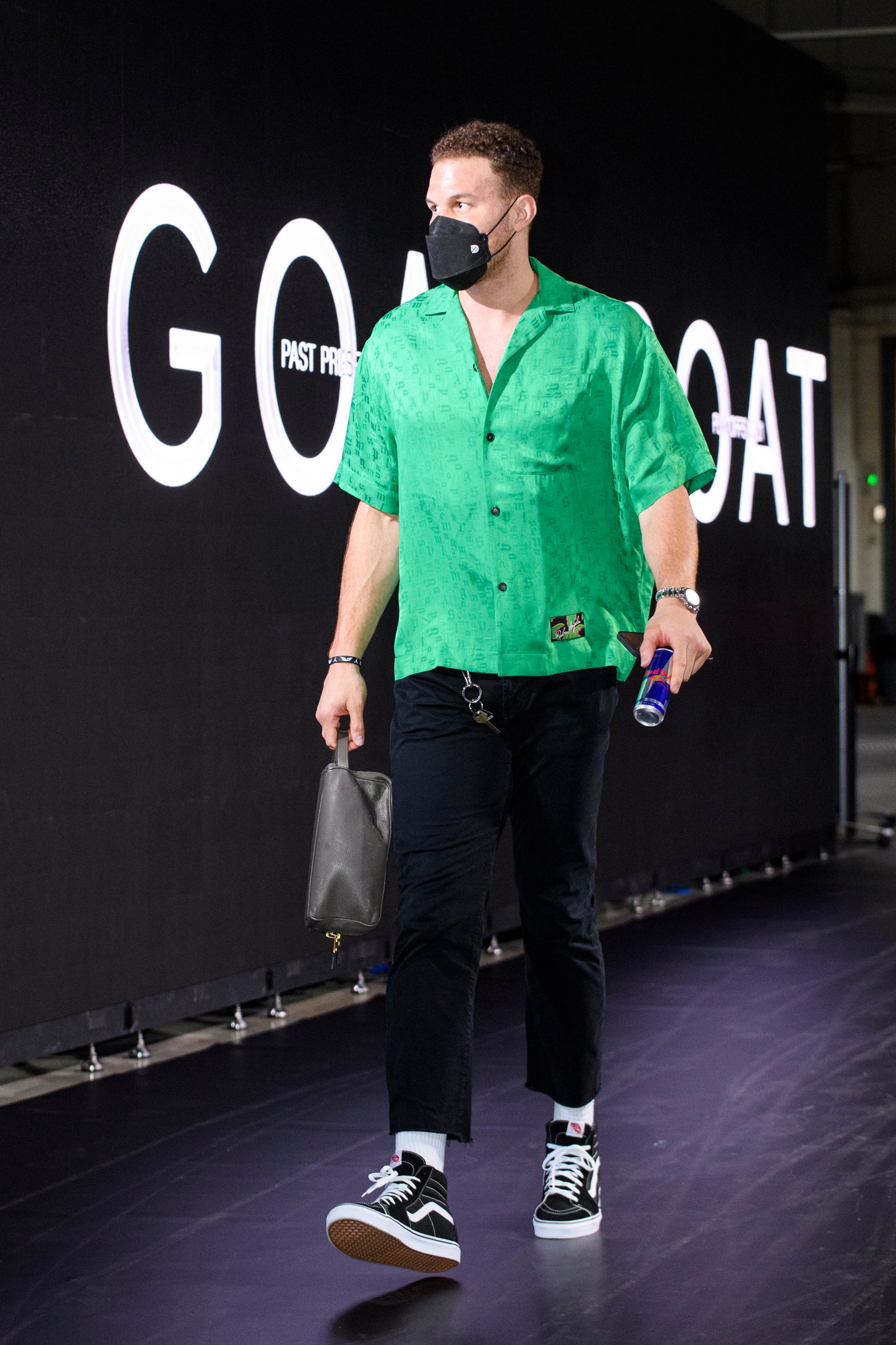 Image may contain Human Person Clothing Shoe Footwear Apparel Sleeve Fashion Pants and Long Sleeve