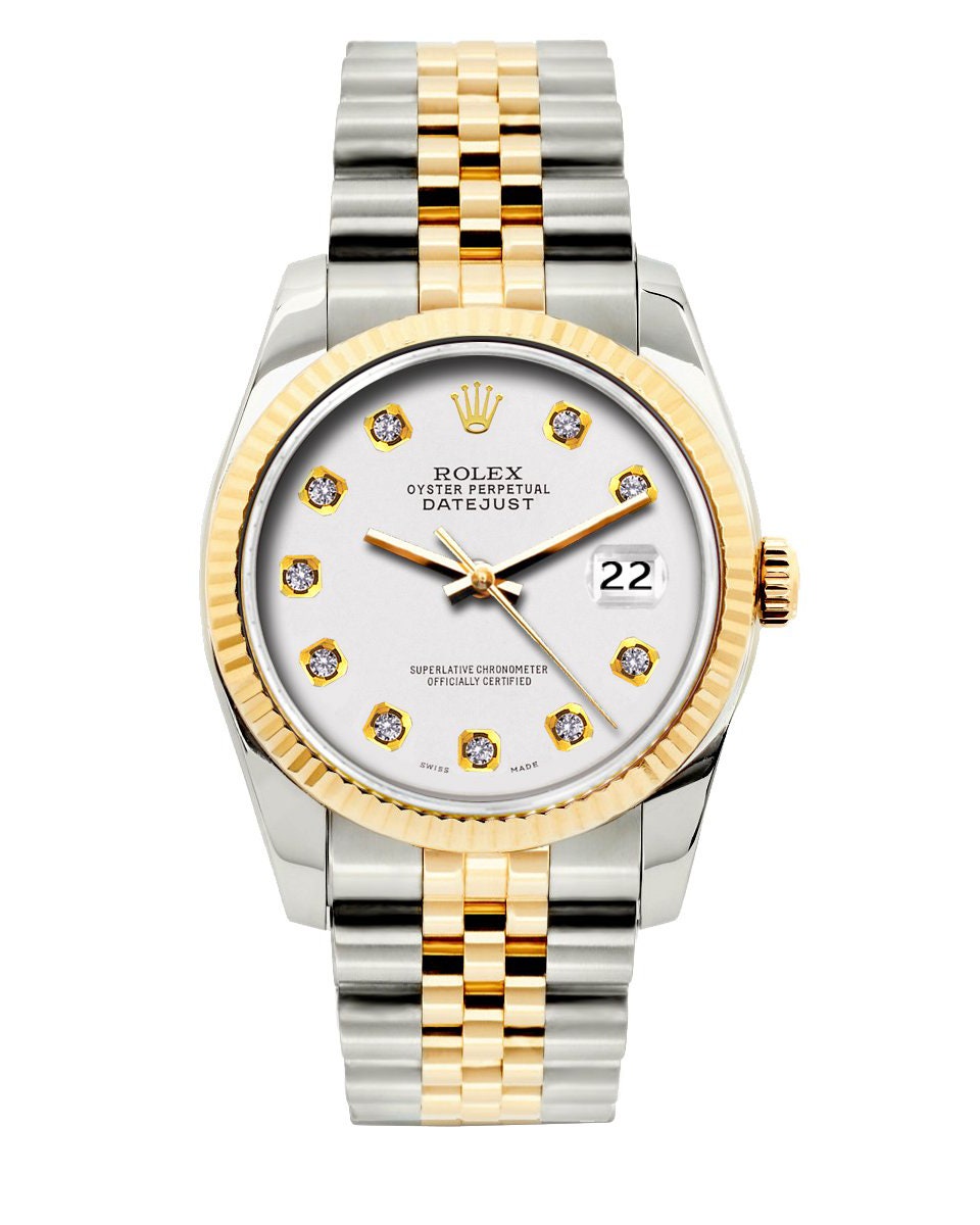 A silver watch with gold accents