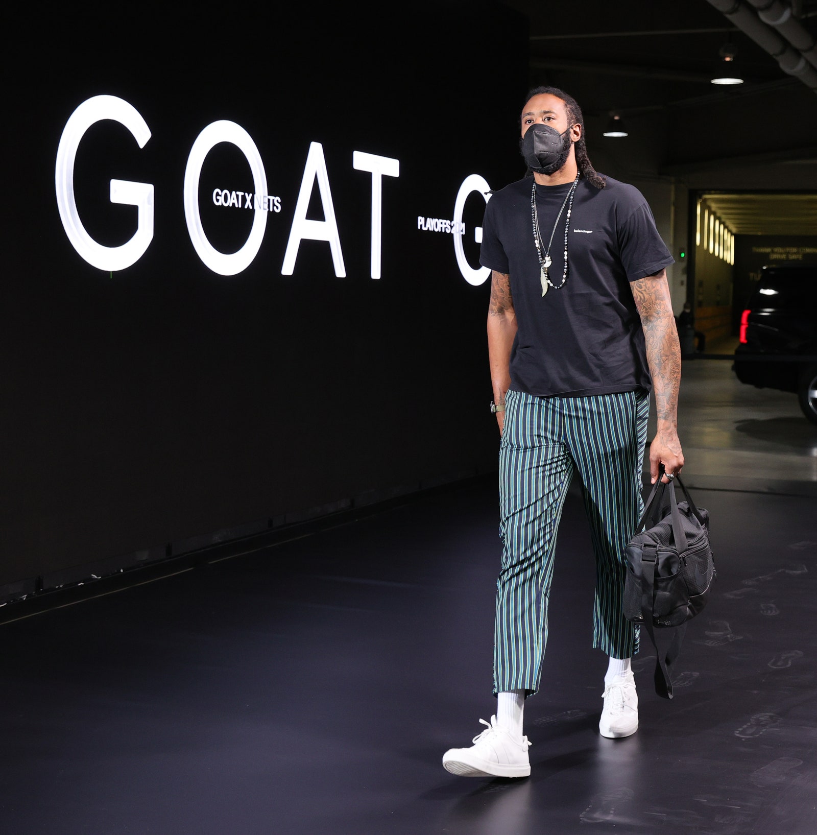 Travis Scott Crushes the Courtside Uniform