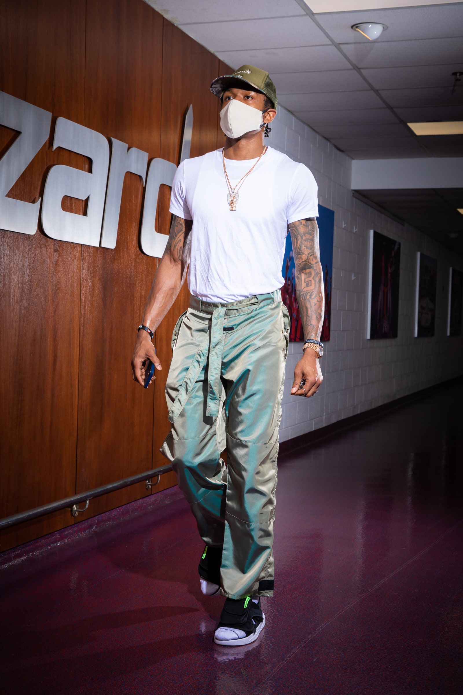 Image may contain Human Person Clothing Apparel Helmet Shoe Footwear and Fashion