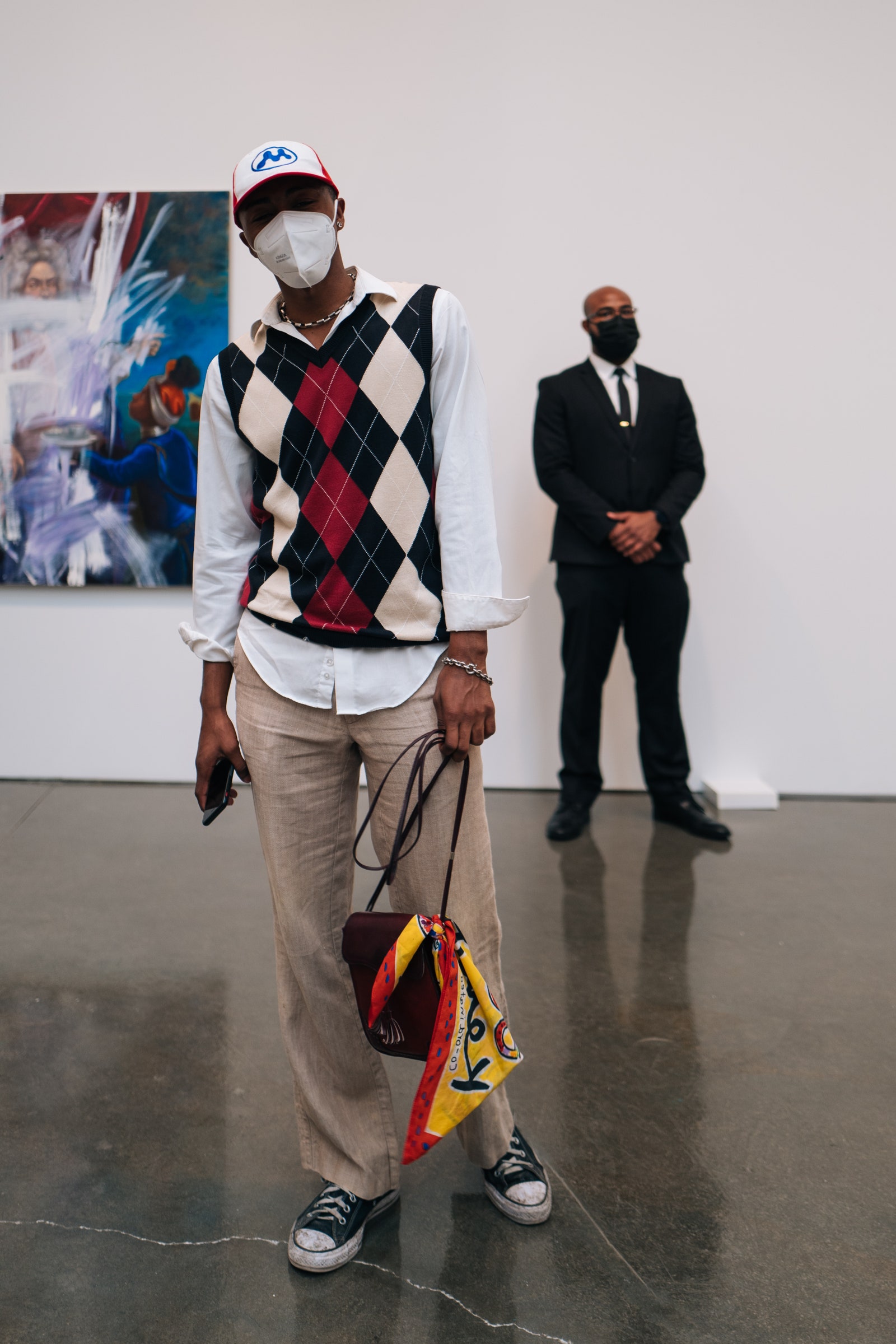 Image may contain Clothing Apparel Human Person Footwear Shoe Sleeve Suit Coat Overcoat Long Sleeve and Helmet
