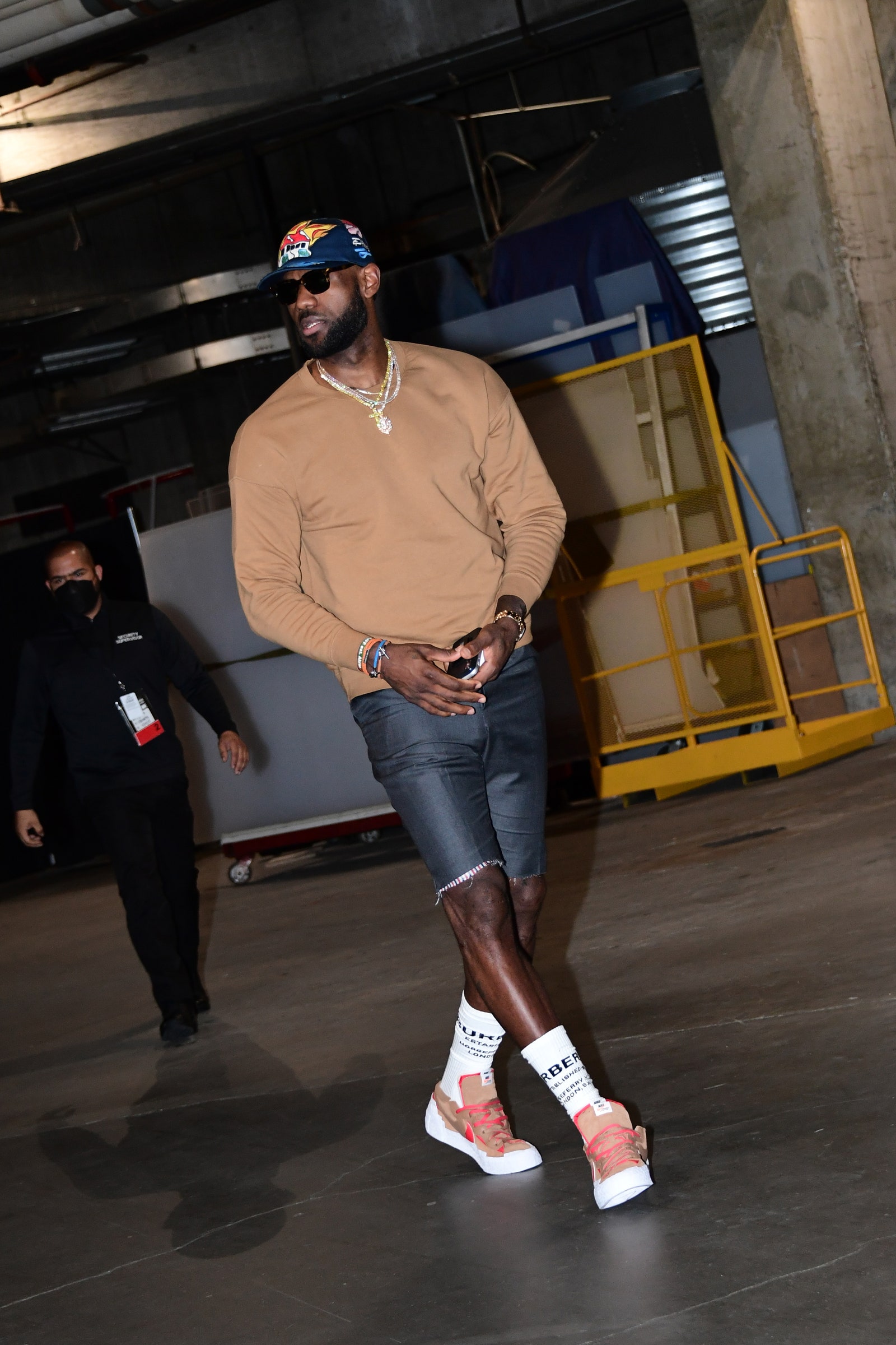 Image may contain Clothing Apparel Human Person Shoe Footwear Sunglasses Accessories and Accessory