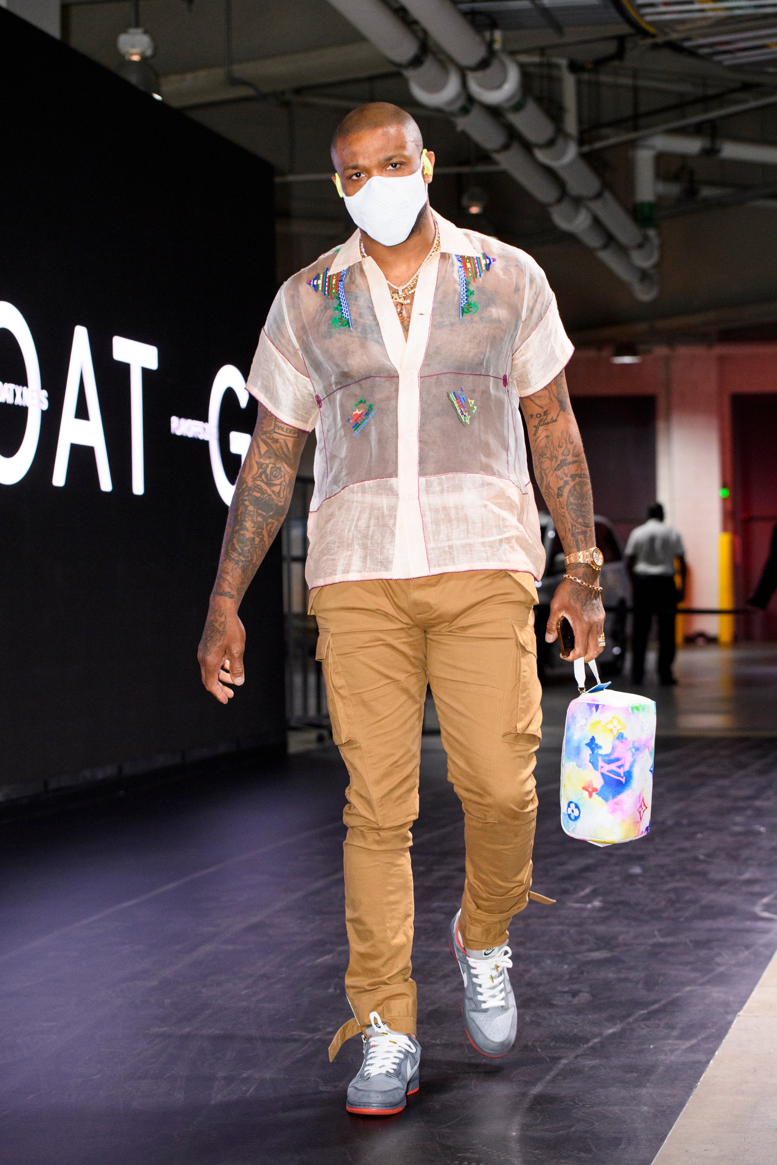 Image may contain Human Person Clothing Shoe Footwear Apparel and Skin