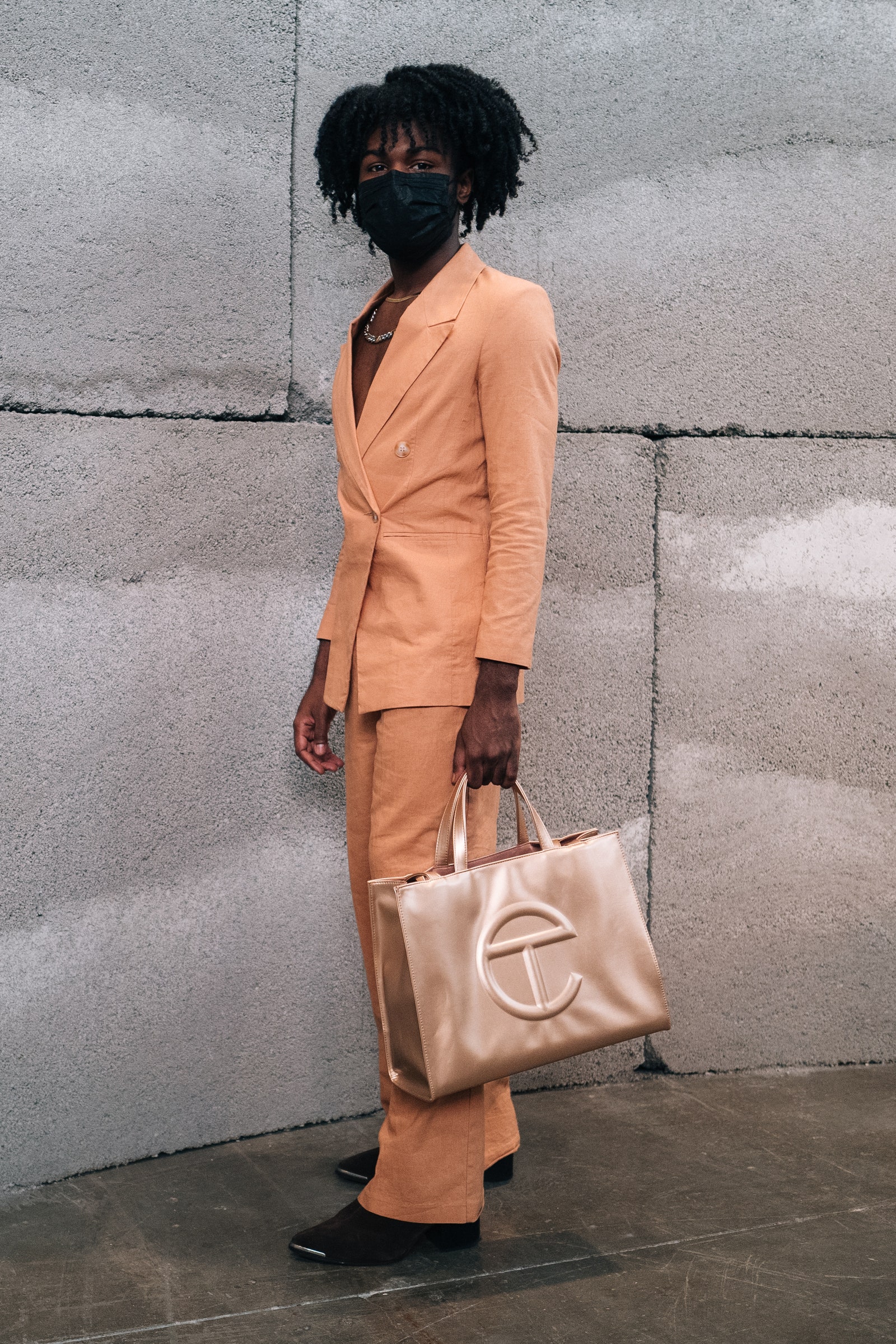 A guest who secured a Telfar Bag and suit to match.