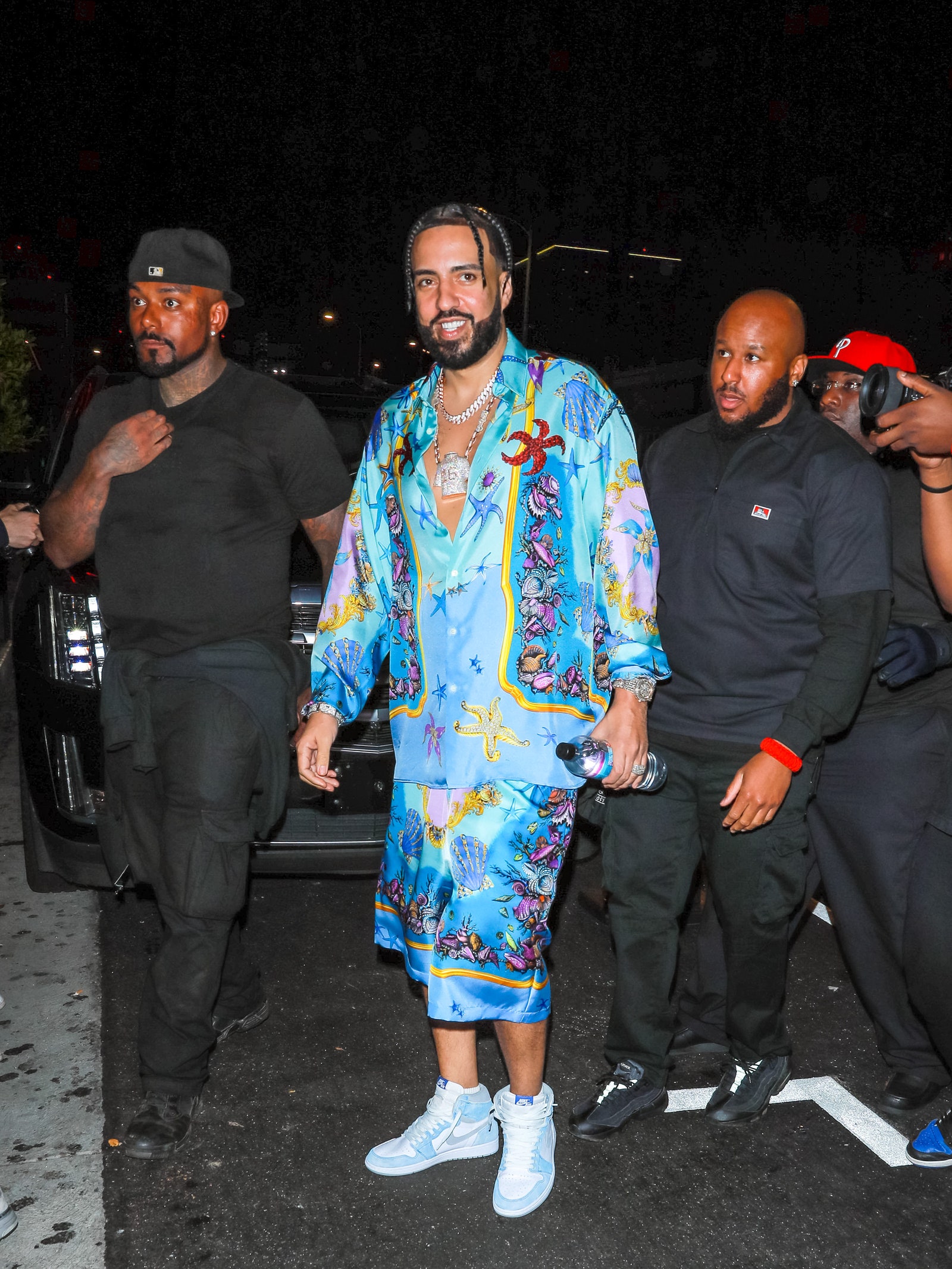 Image may contain Footwear Clothing Shoe Apparel Human Person Skin and French Montana