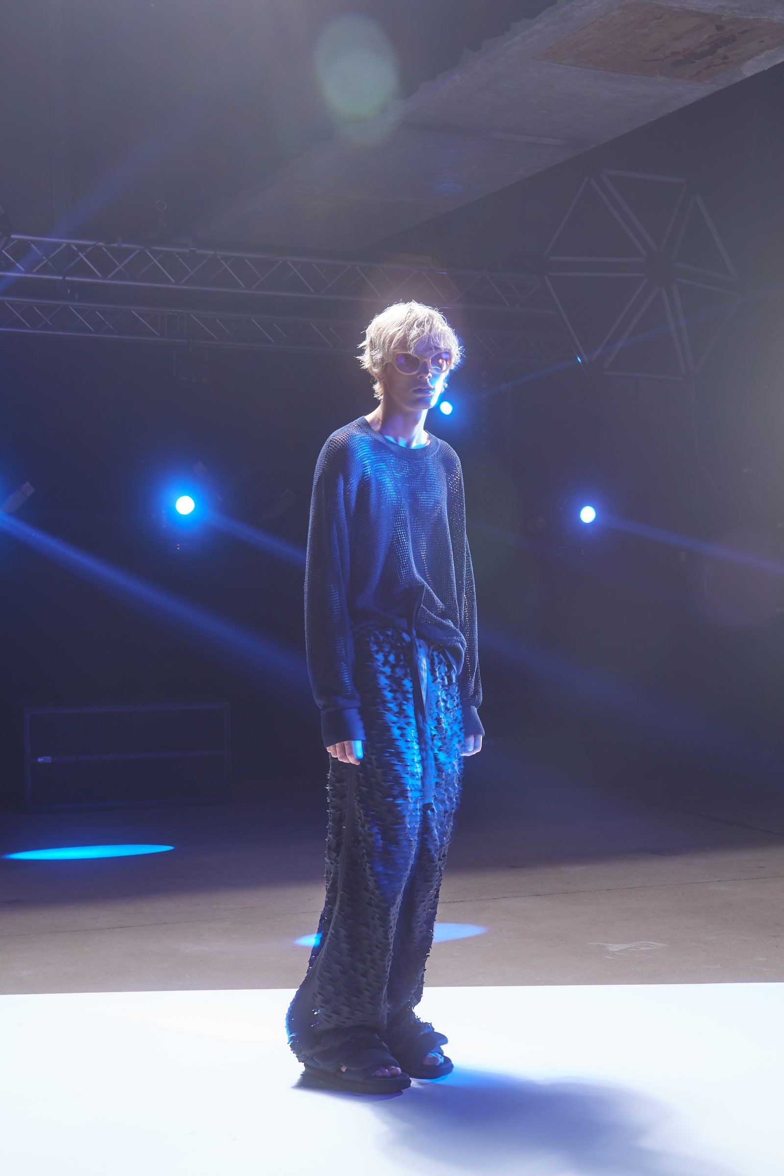 Image may contain Lighting Human Person Crowd and Concert