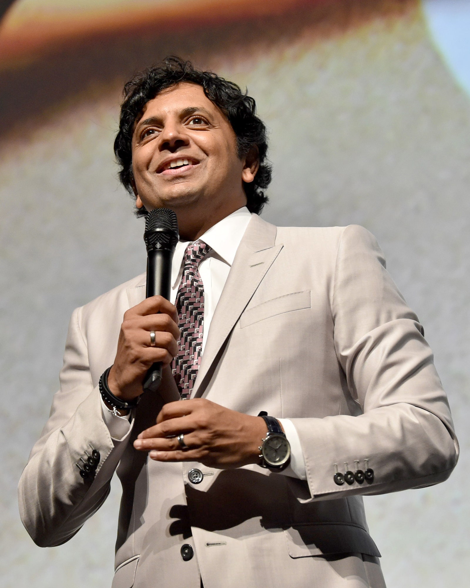 M. Night Shyamalan speaks onstage during the OLD World Premiere