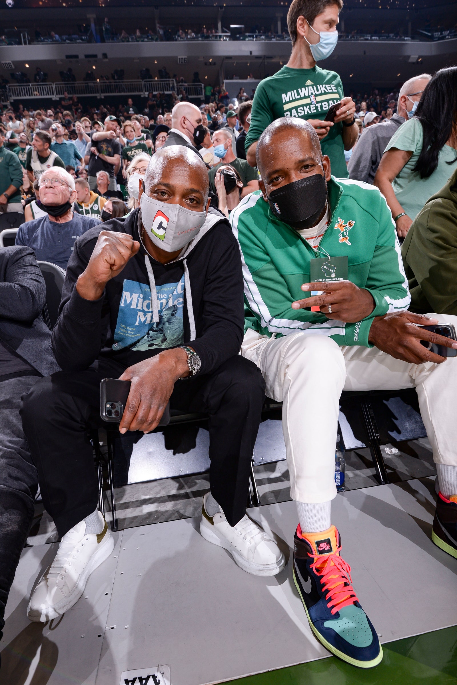 Dave Chapelle and Milwaukee Bucks Legend Michael Redd pose for a photo before the game between the Phoenix Suns and...