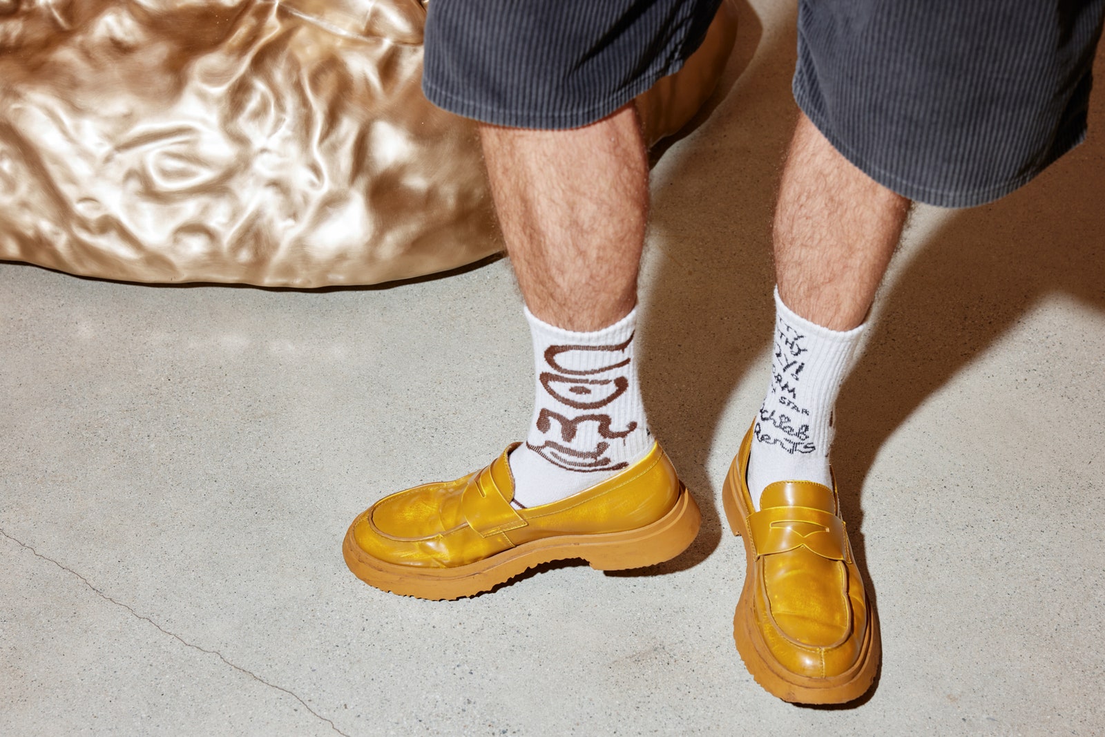 Image may contain Clothing Apparel Footwear Human Person Shoe and Boot