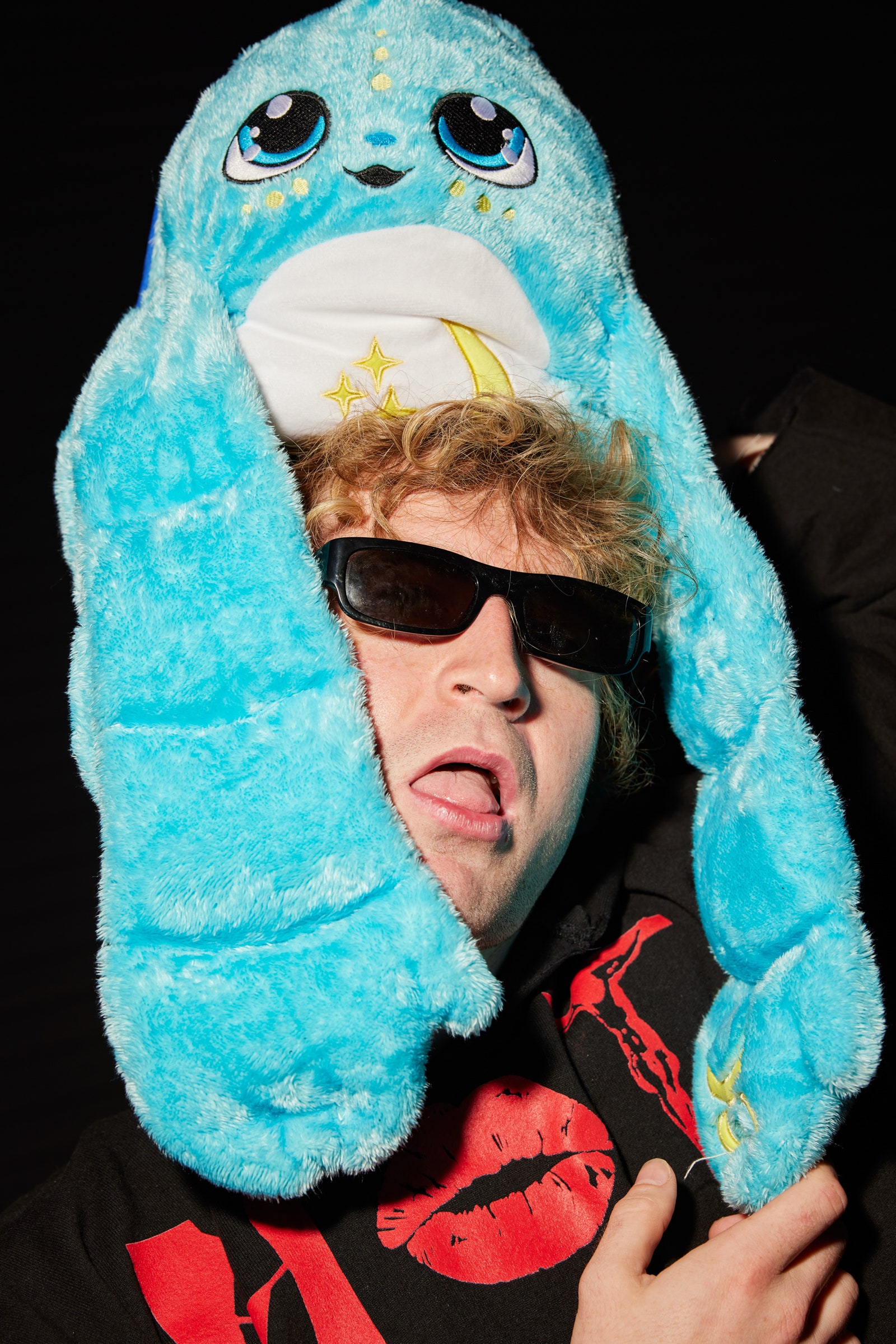 Image may contain Sunglasses Accessories Accessory Clothing Apparel Human Person and Finger