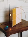Coulisse table lamp designed by Tomás Alonso, in bamboo, washi paper and copper-coated steel.