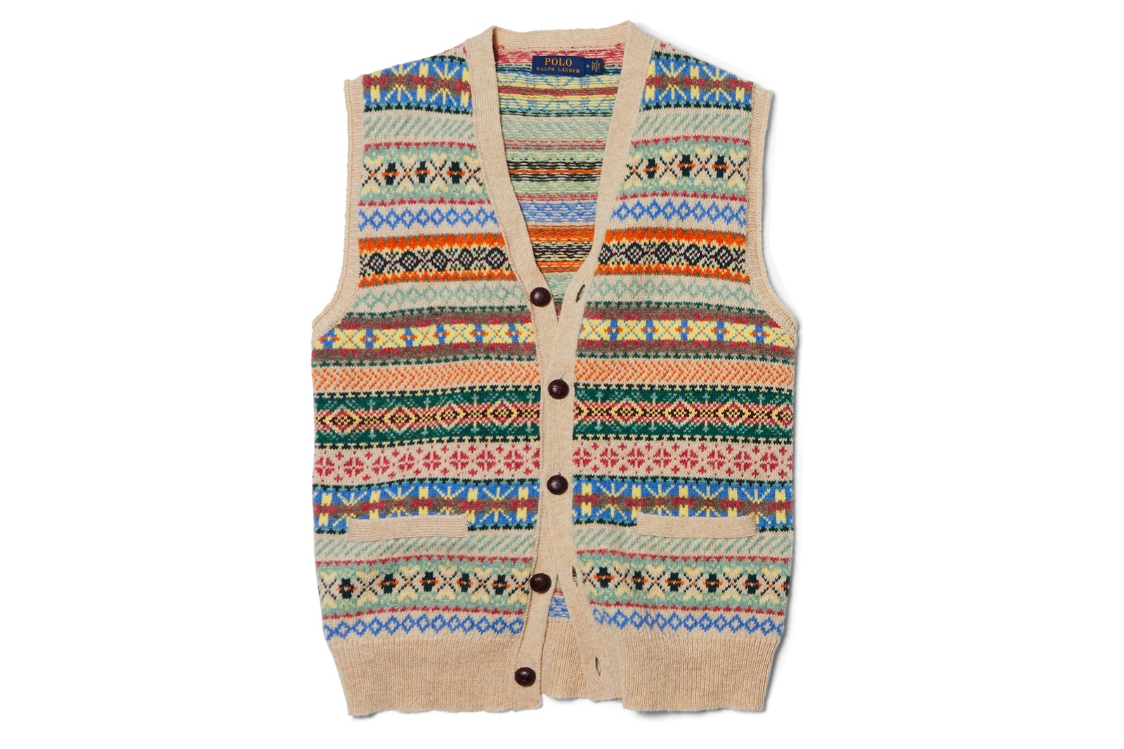 Image may contain Clothing Apparel Vest and Sweater