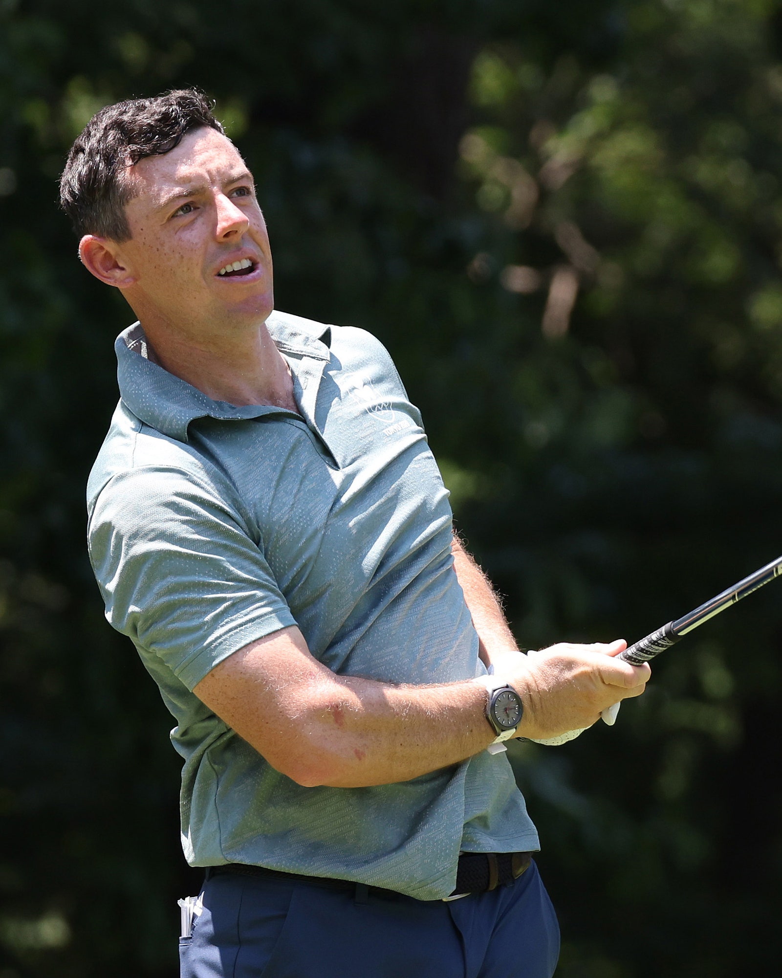 Rory McIlroy of Team Ireland plays his shot from the third tee during the final round of the Men