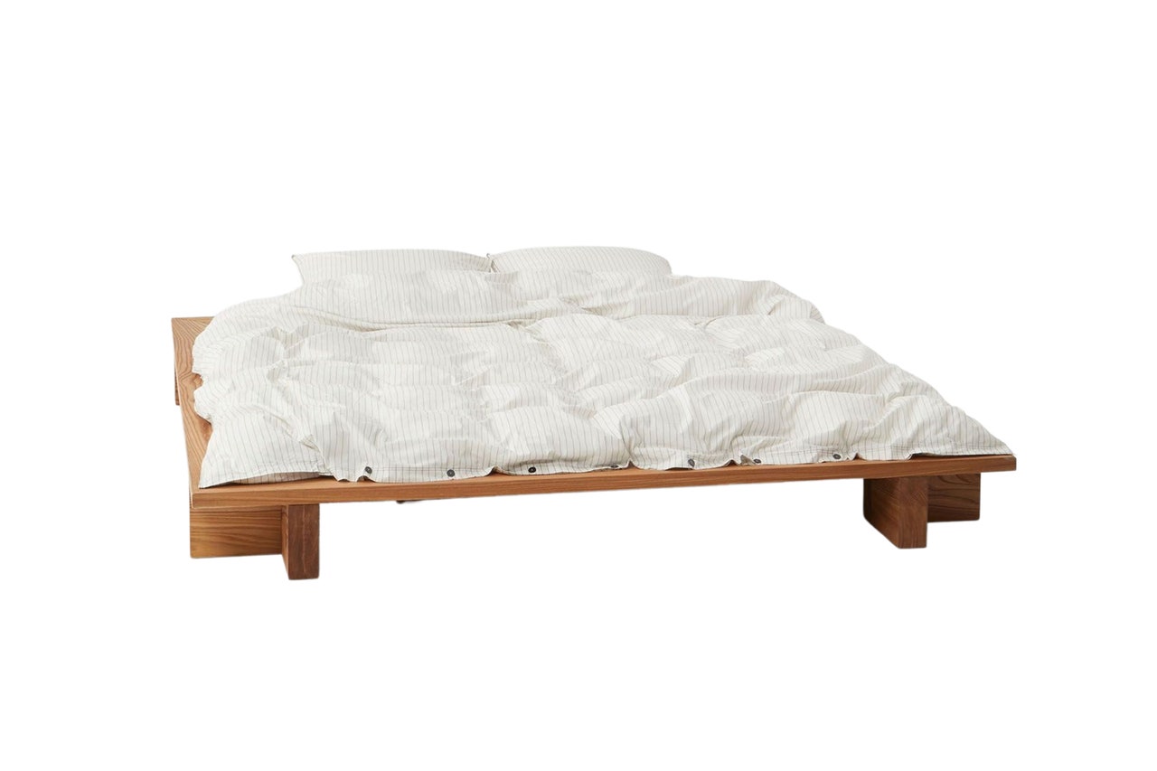 Image may contain: Furniture, Mattress, and Bed