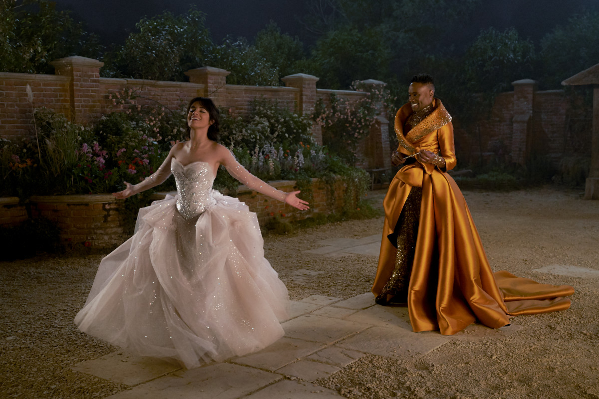Fab G (Billy Porter) brings Cinderella's fantasy gown to life.