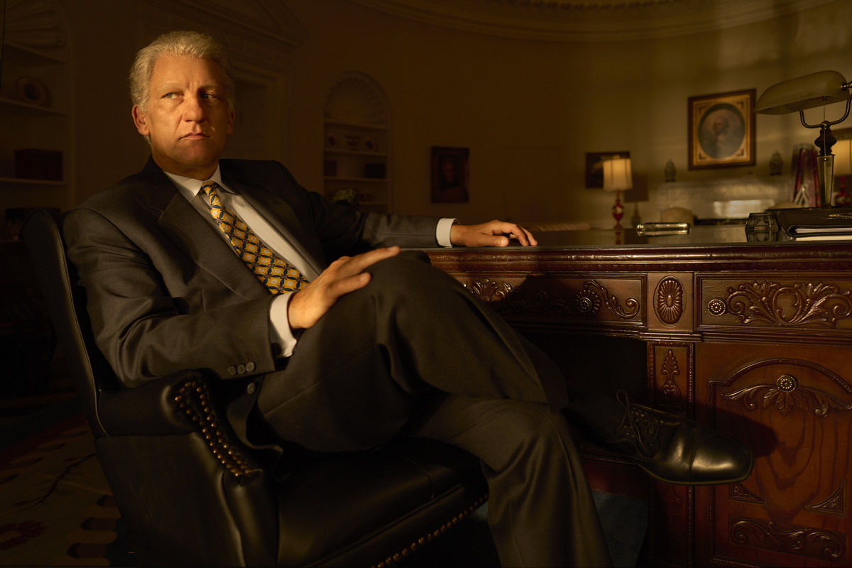 President Bill Clinton (Clive Owen) in his signature suit and printed tie.