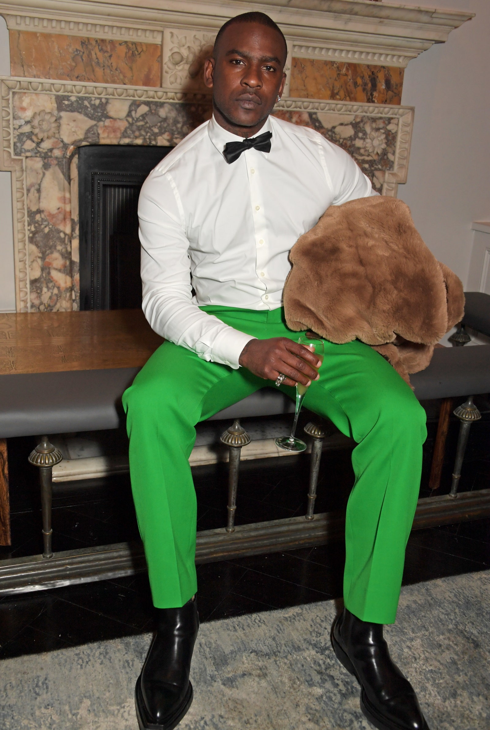 Image may contain Tie Accessories Accessory Skepta Clothing Apparel Human Person Shoe Footwear and Home Decor