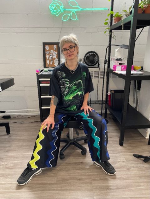 Tattoo artist salad sitting in Montreal studio