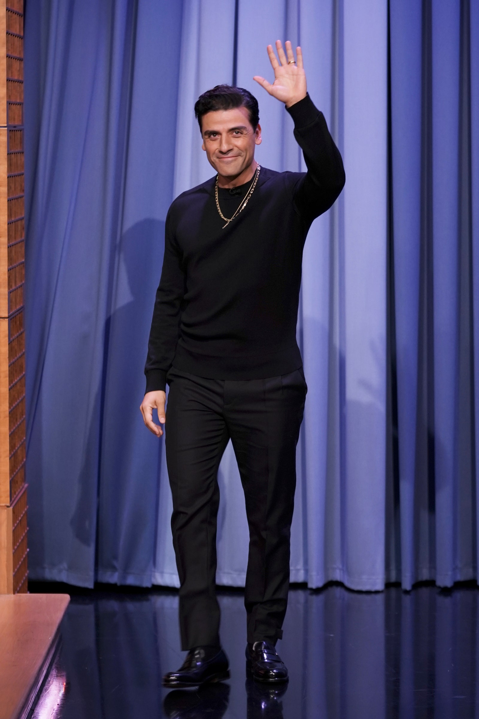 Image may contain Oscar Isaac Clothing Sleeve Apparel Human Person Long Sleeve Shoe and Footwear
