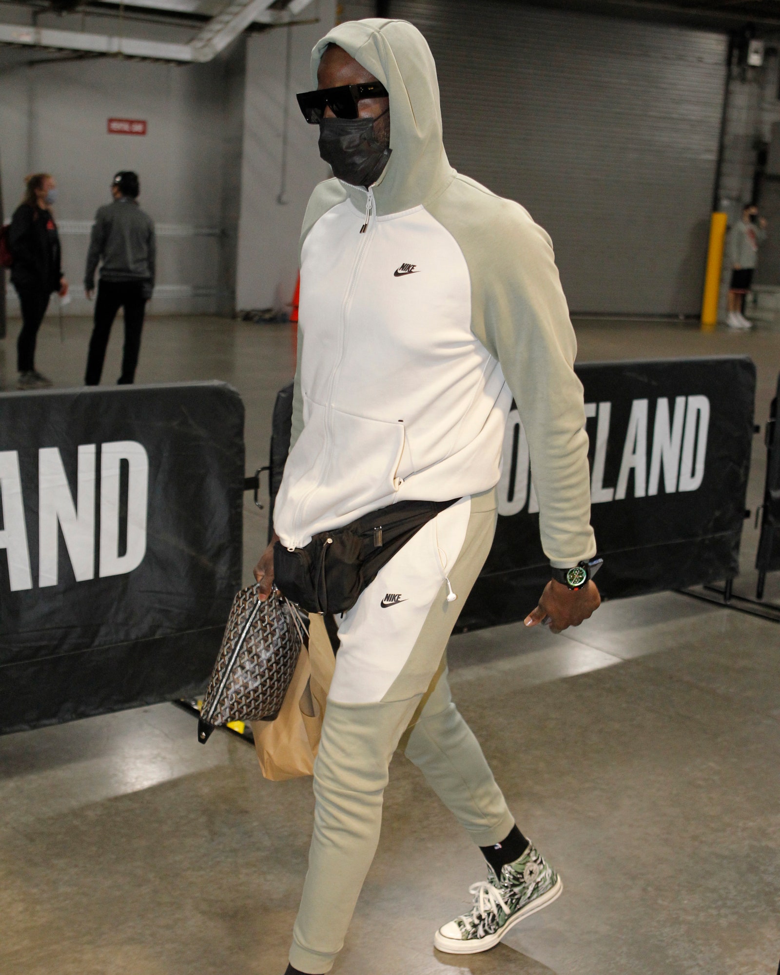 Draymond Green 23 of the Golden State Warriors arrives to the arena prior to a preseason game against the Portland Trail...