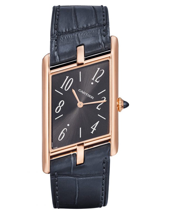 A gold watch with a navy blue face and sapphire accents