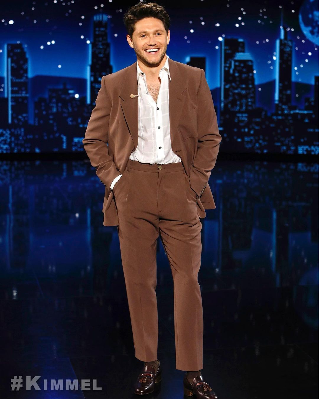 Niall Horran in brown suit