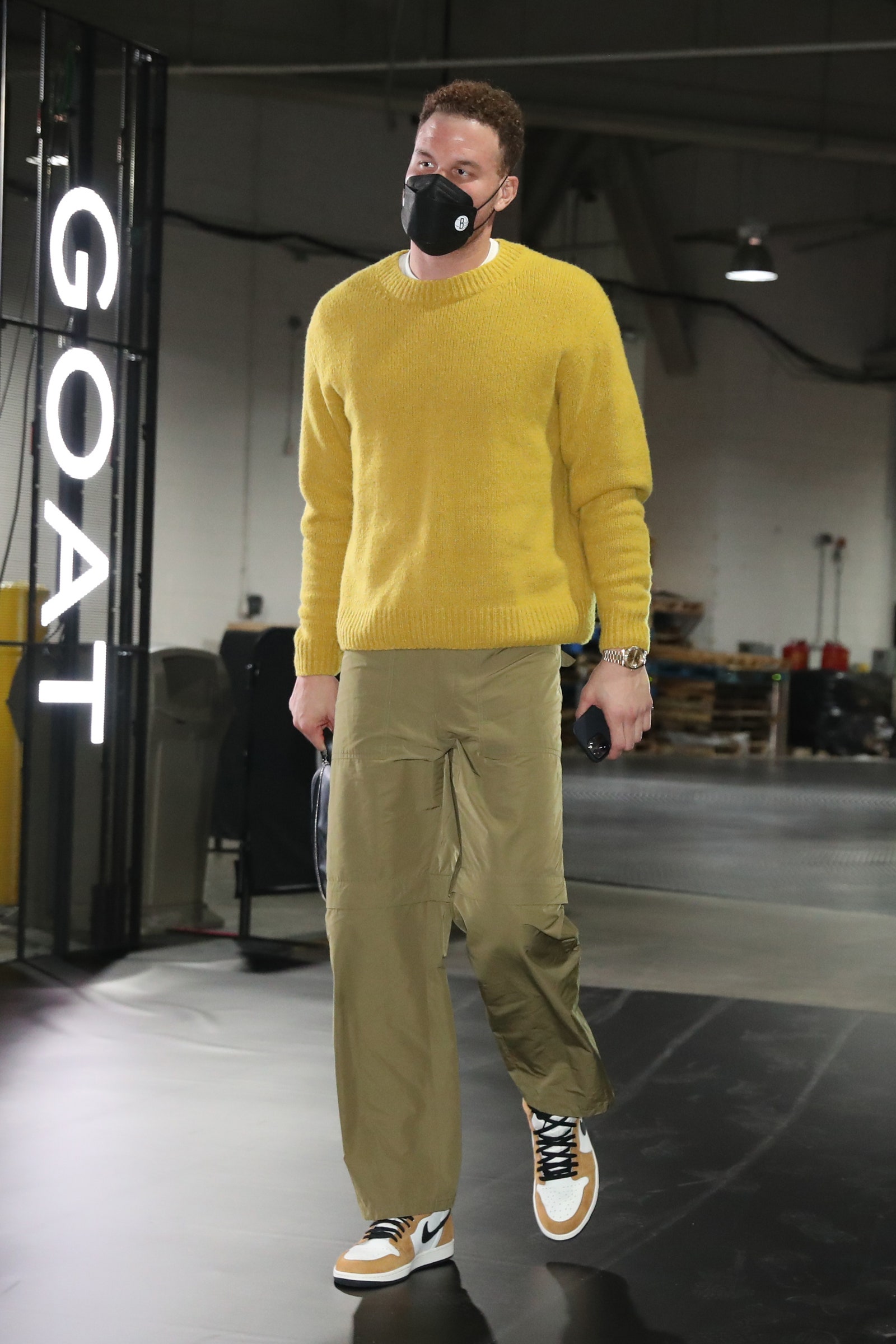 Image may contain Clothing Shoe Footwear Apparel Human Person Sleeve Long Sleeve and Blake Griffin